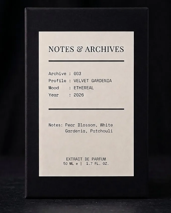 The rigid slider box for Archive 003: Velvet Gardenia, its cream label printed with the archive number, profile, mood and notes.