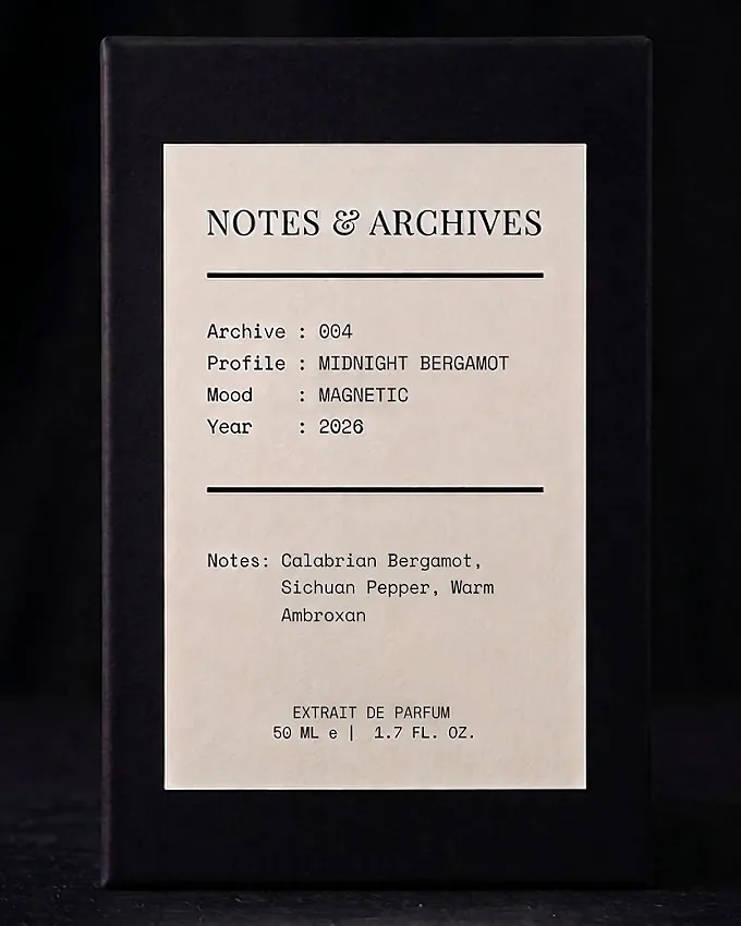 The rigid slider box for Archive 004: Midnight Bergamot, its cream label printed with the archive number, profile, mood and notes.