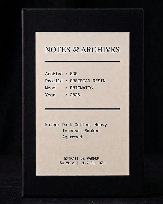 The rigid slider box for Archive 005: Obsidian Resin, its cream label printed with the archive number, profile, mood and notes.